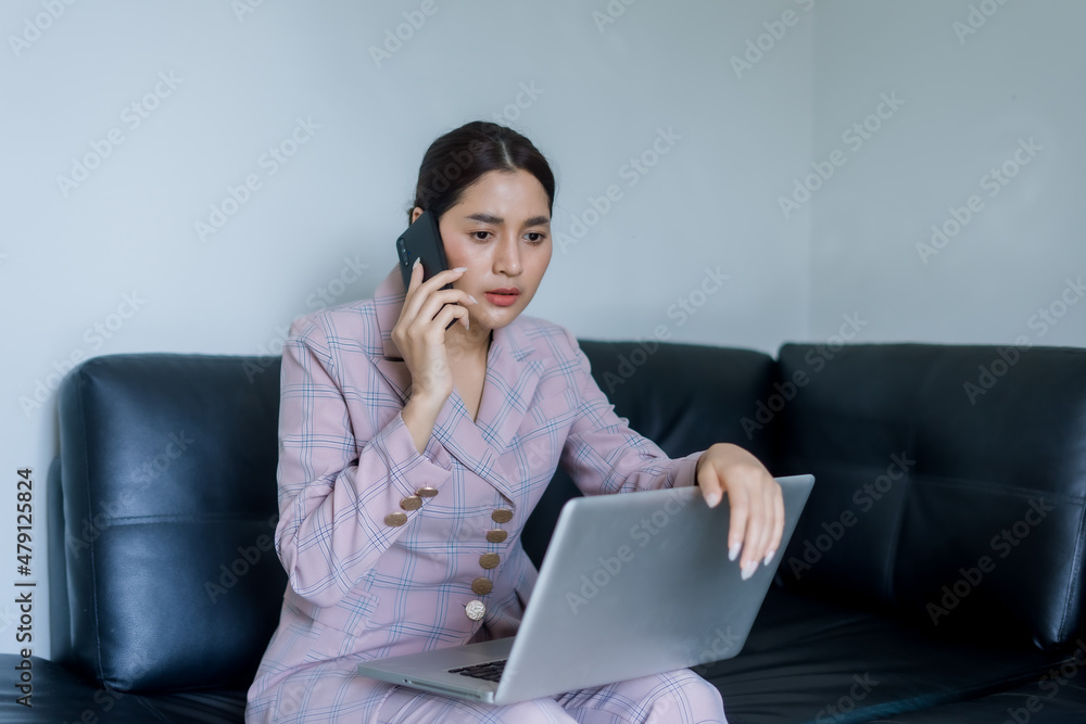 businesswoman talking on the phone in office businesswoman talking on the phone in office