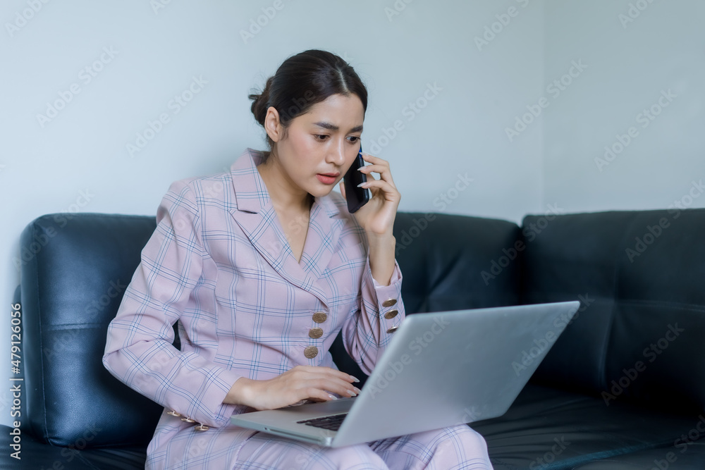 businesswoman talking on the phone in office businesswoman talking on the phone in office