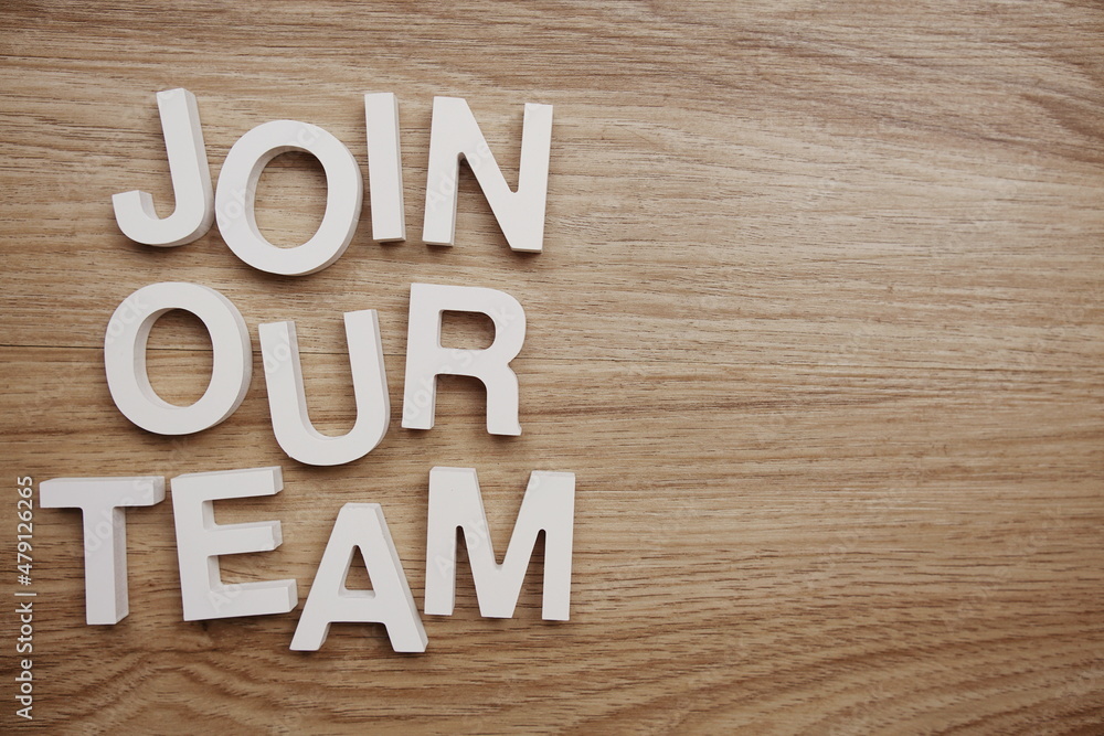 Join Our Team alphabet letters on wooden background