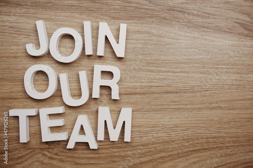 Photography Join Our Team alphabet letters on wooden background