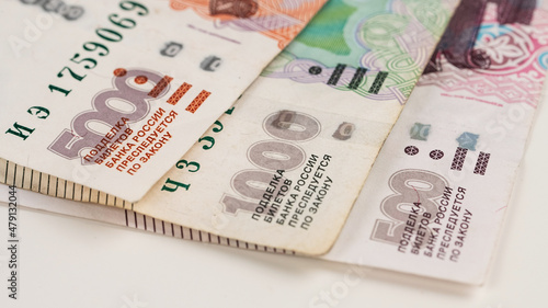 Close-up of banknotes. Five thousand, one thousand, five hundred rubles.