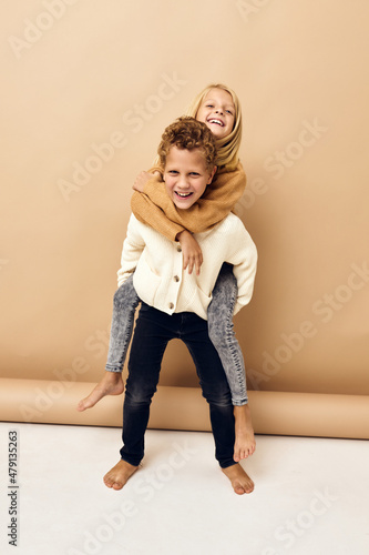 boy and girl together in sweaters fun casual wear