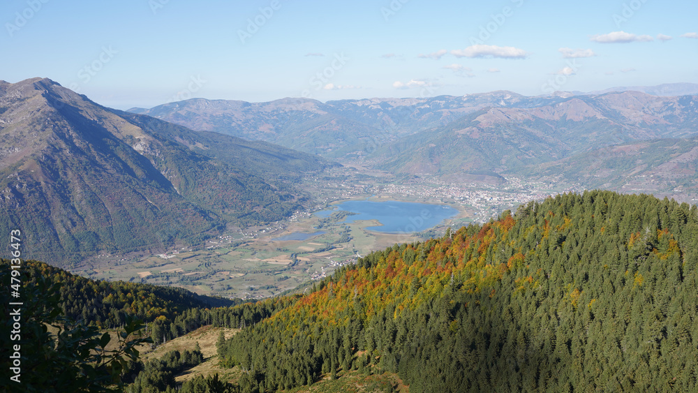 Fototapeta premium Warm summer day in the Prokletije national park within the Dinaric Alps Mountain Range on the Peaks of the Balkans Trail near Plav, Montenegro.