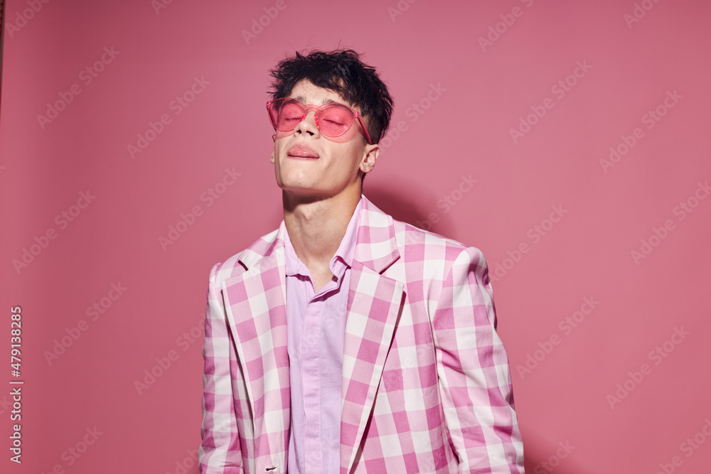 Fototapeta premium pretty man self confidence pink plaid blazer fashion posing isolated background unaltered