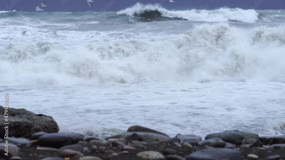 Storm waves and dramatic black sky on the horizon. on the beach, Storm waves and dramatic black sky on the horizon. on the beach,
