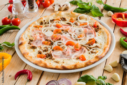 italian pizza on the wooden background