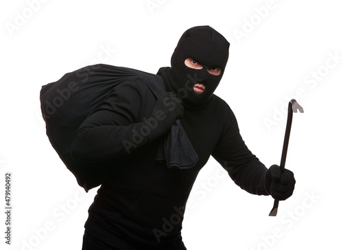Fotografia Thief in mask with crowbar and bag on white background