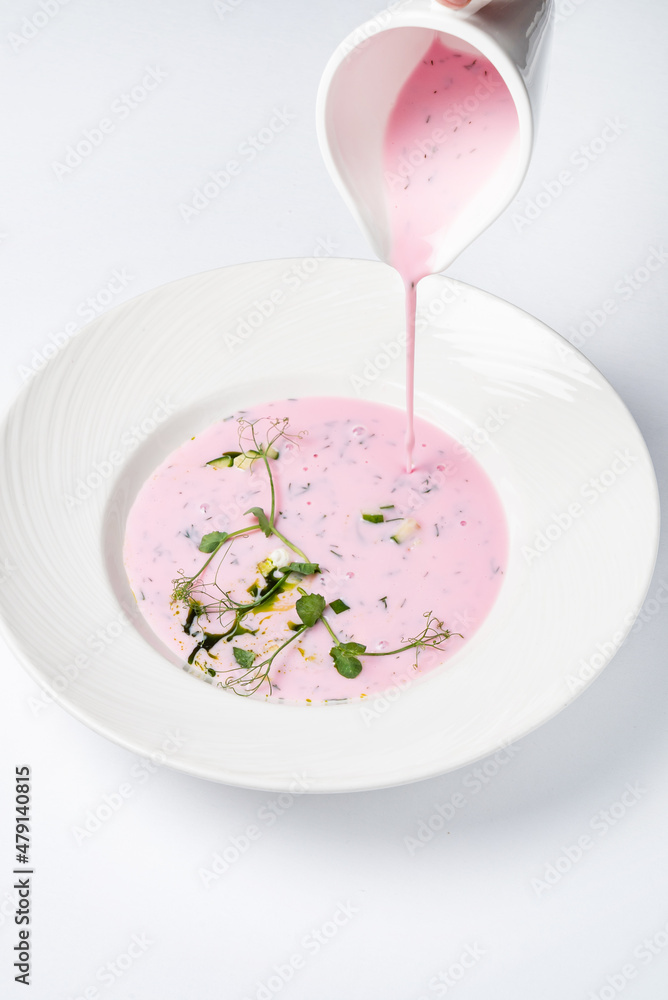 cold beetroot soup on the white background cold beetroot soup on the white background