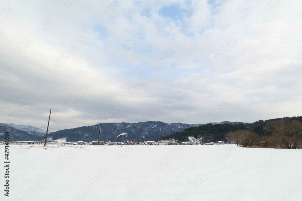 Landscape of snow-covered plains in Shiga Prefecture, Japan in mid-winter. Landscape of snow-covered plains in Shiga Prefecture, Japan in mid-winter.