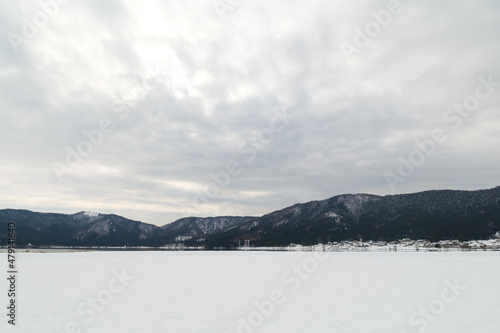 Landscape of snow-covered plains in Shiga Prefecture, Japan in mid-winter.