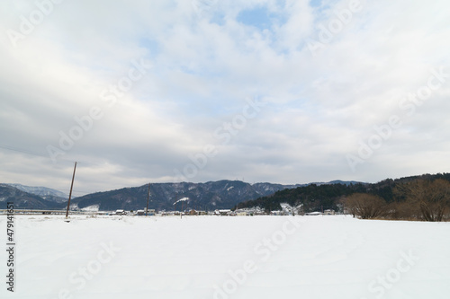Landscape of snow-covered plains in Shiga Prefecture, Japan in mid-winter.