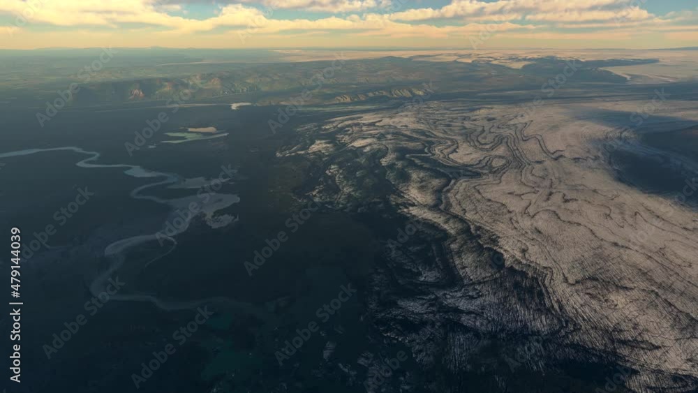 High altitude aerial of Iceland is a Nordic island country in the North Atlantic Ocean and the most sparsely populated land in Europe showing rough landscape rivers and glaciers 4k resolution animatio High altitude aerial of Iceland is a Nordic island country in the North Atlantic Ocean and the most sparsely populated land in Europe showing rough landscape rivers and glaciers 4k resolution animatio