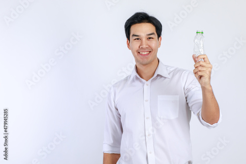 Handsome, friendly face asian man smile happy, dressed casually campaign say no plastic, reducing plastic, reducing global warming, studio light shot isolated on white background. Environment concept