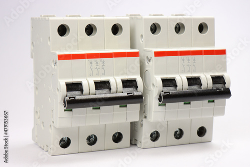 3-pole current circuit breakers on a white background.