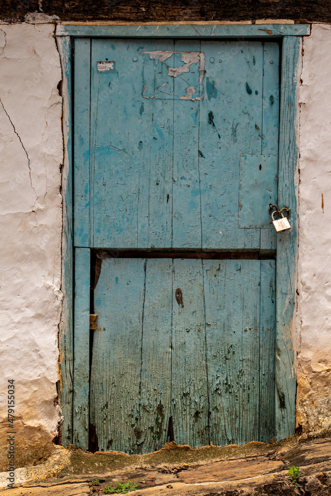 Beautiful old blue wooden door in Barichara, Colombia.