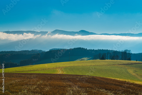 Germany, Black forest mountains panorama nature landscape misty clouds in valley on sunny day in tourism region perfect for hiking