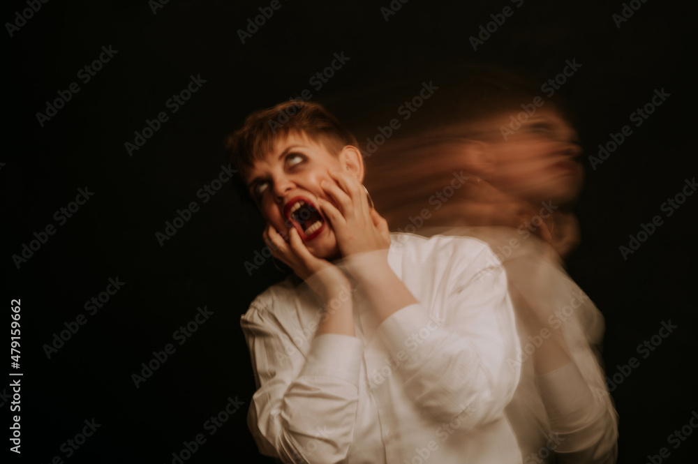 portrait of a psychopathic woman with mental disorders and spiritual diseases on a dark background portrait of a psychopathic woman with mental disorders and spiritual diseases on a dark background
