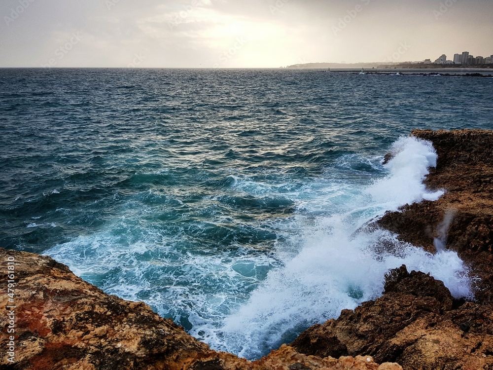 waves breaking on the rocks waves breaking on the rocks