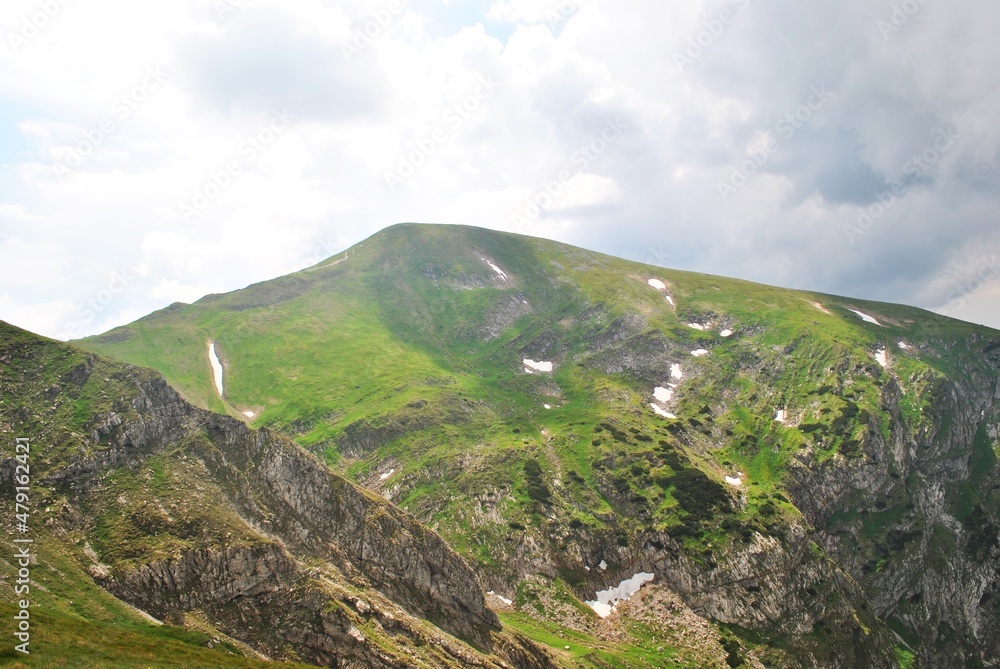 Fototapeta premium Beautiful mountain landscape. A trail leading through the Tatra National Park.