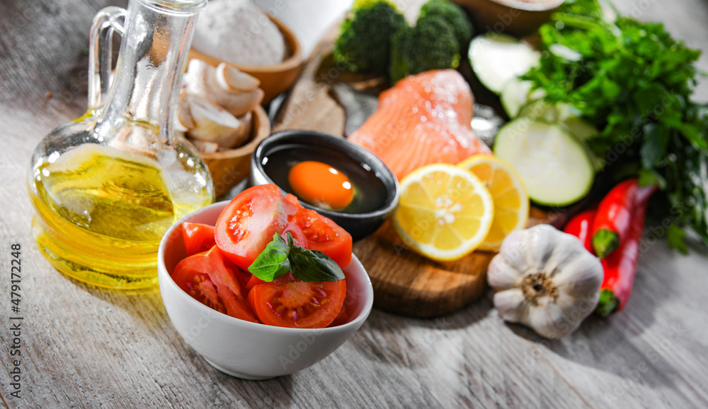 Fresh food ingredients prepared for cooking on a kitchen table Fresh food ingredients prepared for cooking on a kitchen table