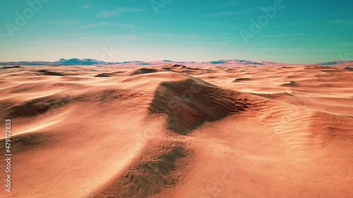 wide and wild landscape of the Arabic sand desert photo