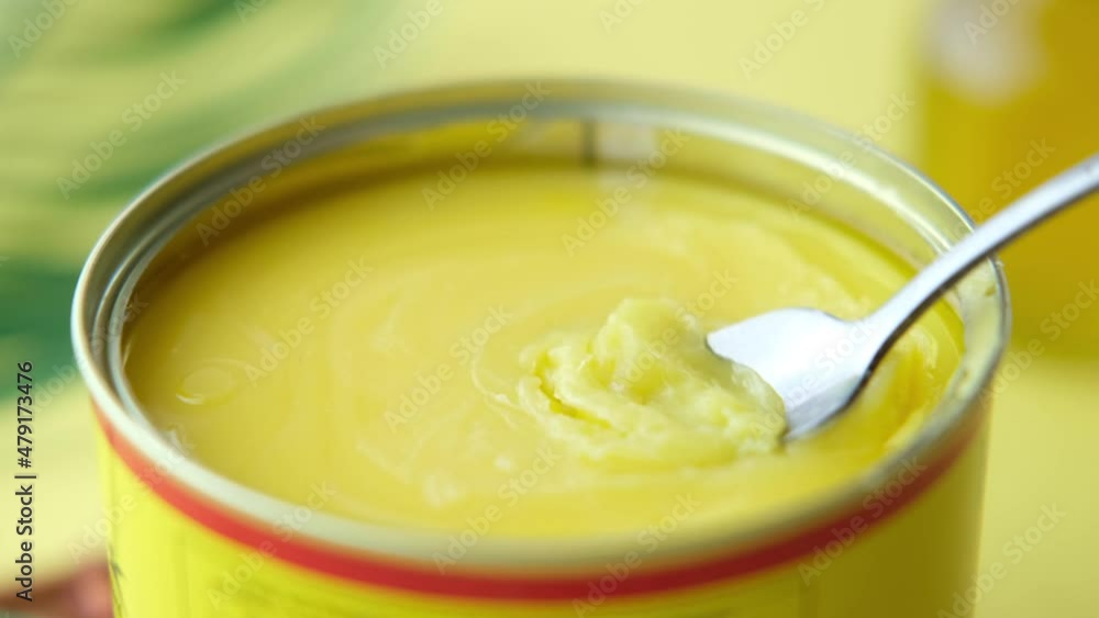 homemade ghee in container on a table , homemade ghee in container on a table ,