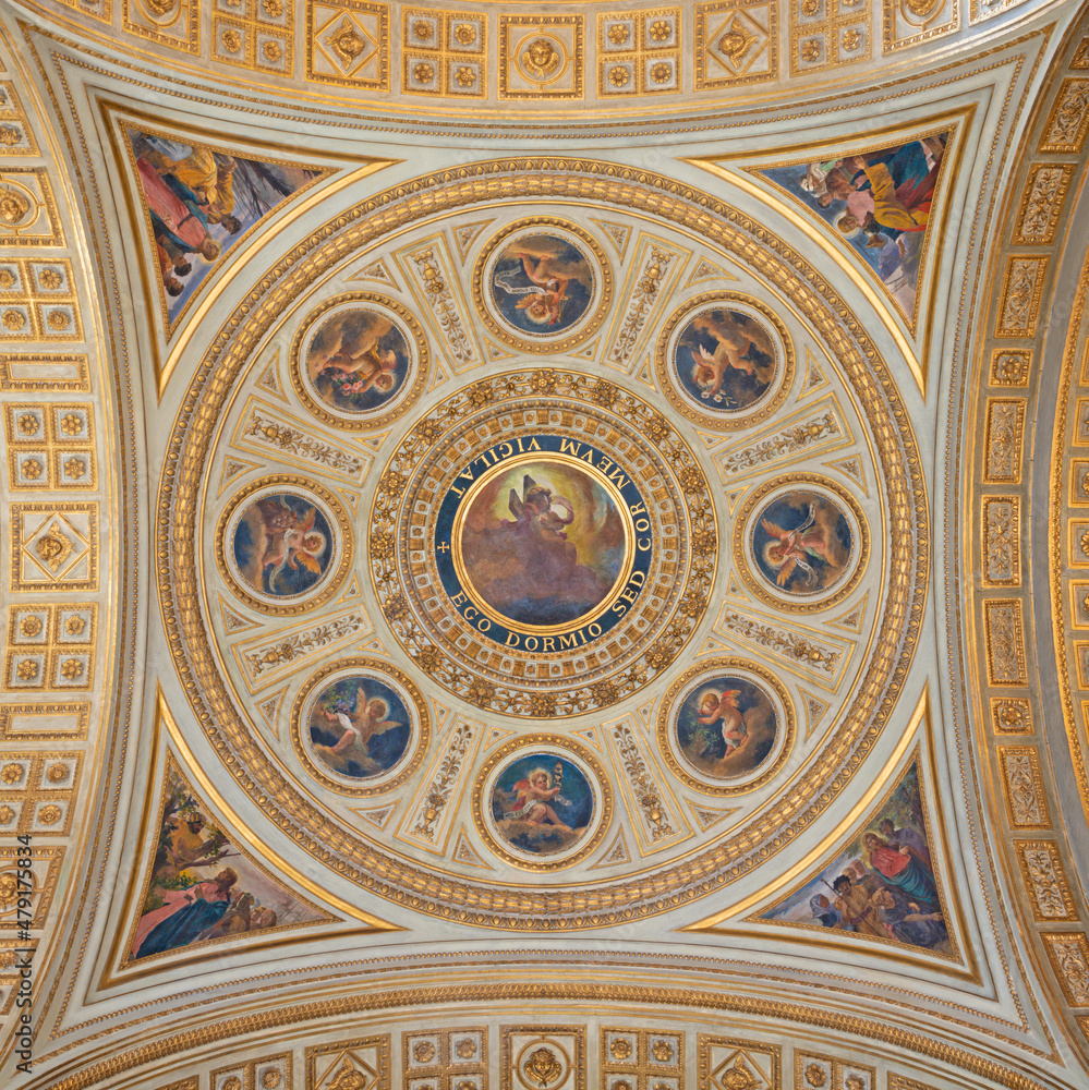ROME, ITALY - AUGUST 31, 2021: The ceiling fresco (new testament scenes and angels) in the side cupola in the church Chiesa del Sacro Cuore di Gesù by Virginio Monti (1852 - 1942).
