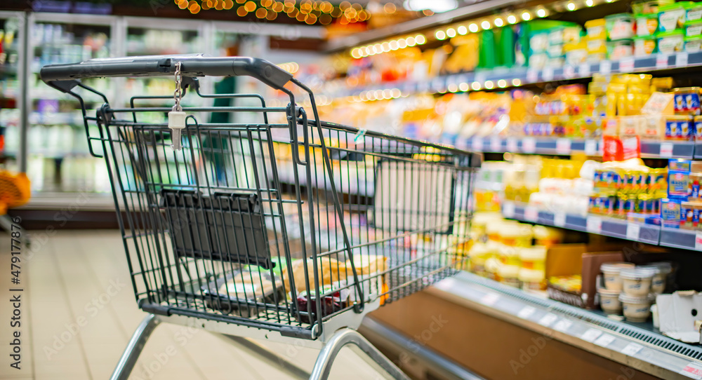 A shopping cart in a supermarket A shopping cart in a supermarket