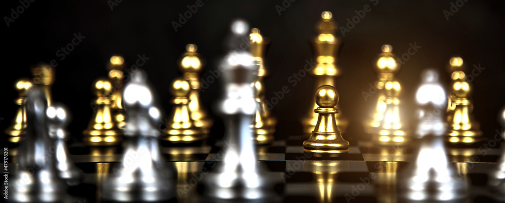 Close-up chess standing on chess board concept of team player or business team and leadership strategy and human resources organization management. Close-up chess standing on chess board concept of team player or business team and leadership strategy and human resources organization management.