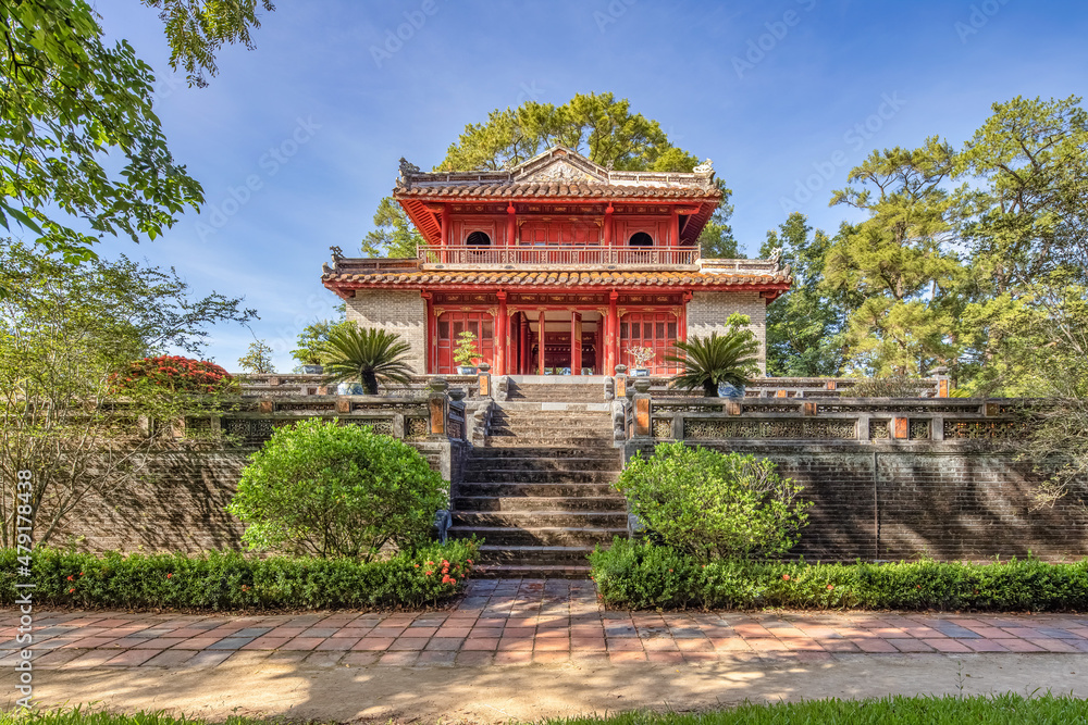 Minh Mang tomb near the Imperial City with the Purple Forbidden City within the Citadel in Hue, Vietnam. Imperial Royal Palace of Nguyen dynasty in Hue. Hue is a popular Minh Mang tomb near the Imperial City with the Purple Forbidden City within the Citadel in Hue, Vietnam. Imperial Royal Palace of Nguyen dynasty in Hue. Hue is a popular