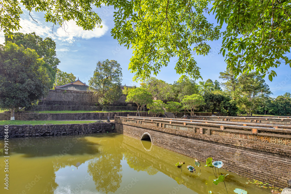Minh Mang tomb near the Imperial City with the Purple Forbidden City within the Citadel in Hue, Vietnam. Imperial Royal Palace of Nguyen dynasty in Hue. Hue is a popular Minh Mang tomb near the Imperial City with the Purple Forbidden City within the Citadel in Hue, Vietnam. Imperial Royal Palace of Nguyen dynasty in Hue. Hue is a popular