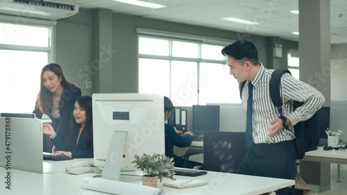 A Male employee coming to work late in office