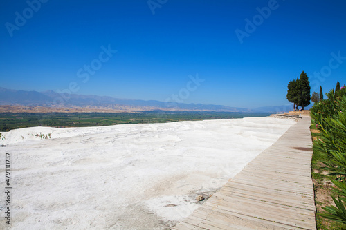 Pamukkale mountain. wooden road for tourists.