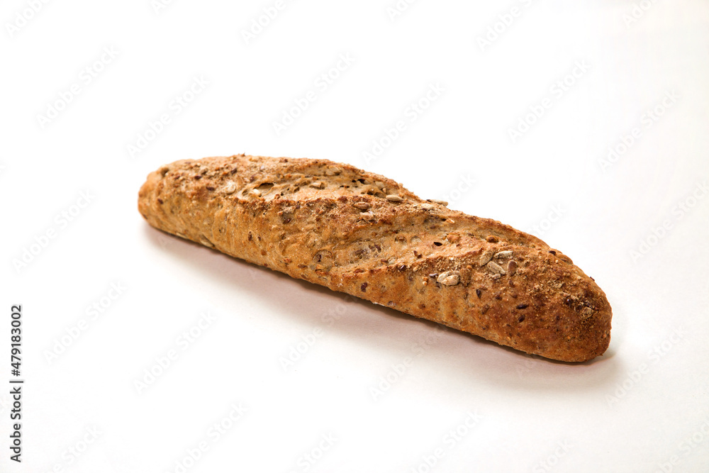 Brown sandwich baguette bread with seasonings and seeds Brown sandwich baguette bread with seasonings and seeds