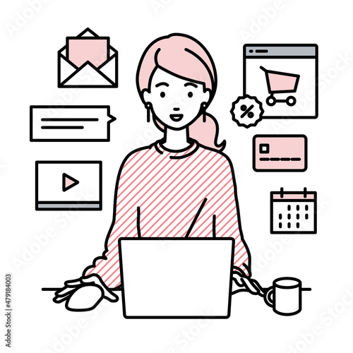 デスクで座ってPCでネットショップやマーケティングの仕事をしているリモートワークの女性