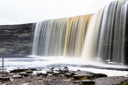 Jegala waterfall on a gray winter day without snow and ice
