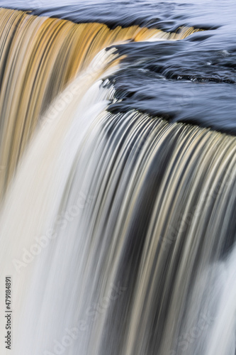 Jegala waterfall on a gray winter day without snow and ice