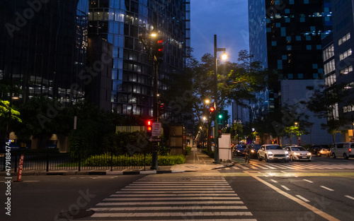 Urban city traffic at night. Bonifacio Global City (BGC), Philippines