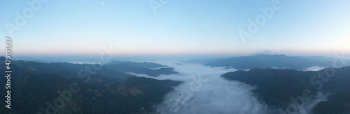 aerial view from drone panoramic landscape morning natural light blue sky and mountain range with fog in valley at chiang rai Thailand, © SHUTTER DIN