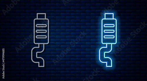 Glowing neon line Car muffler icon isolated on brick wall background. Exhaust pipe. Vector