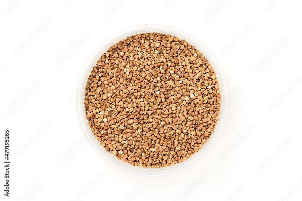 Buckwheat in bowl isolated on white background Buckwheat in bowl isolated on white background