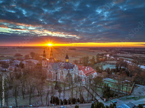  Abbey in Lad, Poland Wielkopolska, polish church during the sunset in winter time from above, drone photo 