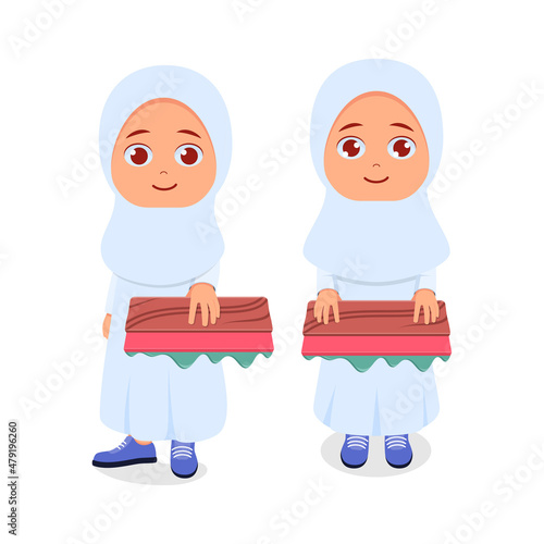 Muslim girl holding a squeegee full of screen printing ink