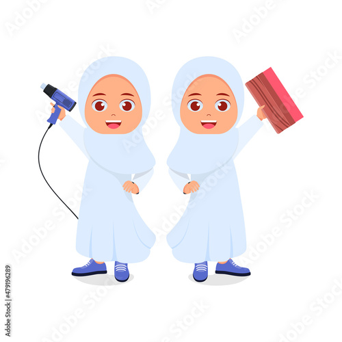 Muslim girl posing holding squeegee and hot air gun