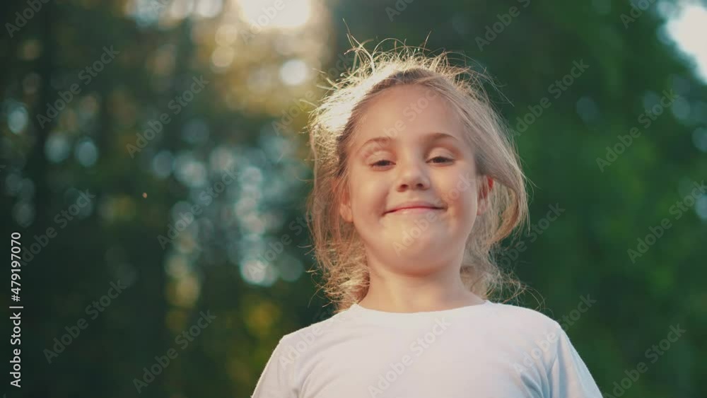 little girl smiling in the park. free happy girl child portrait outdoors in park cute smiling at camera. happy family kid dream concept. childhood family fun summer lifestyle. child smiling portrait little girl smiling in the park. free happy girl child portrait outdoors in park cute smiling at camera. happy family kid dream concept. childhood family fun summer lifestyle. child smiling portrait