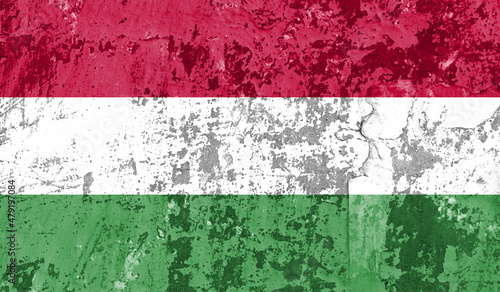 Hungary flag on old paint on wall. 3D image