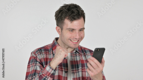 Portrait of Young Man Celebrating on Smartphone