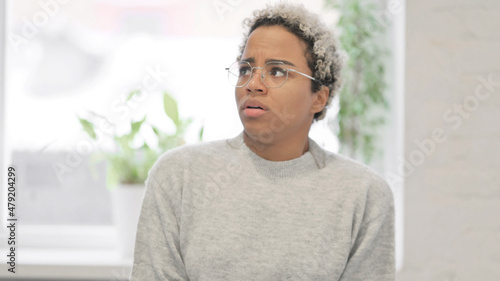 Foto Portrait of African Woman Feeling Scared, Frightened