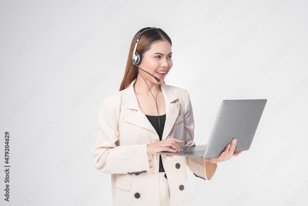 Customer service operator woman in suit wearing headset over white background studio. Customer service operator woman in suit wearing headset over white background studio.