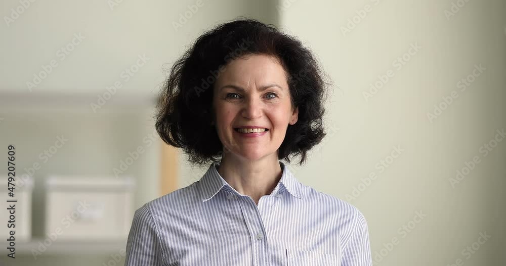 Positive elegant senior businesswoman look pose at camera, head shot. Portrait of satisfied, smiling retiree woman. Dental services, insurance cover for older citizen, professional occupation concept Positive elegant senior businesswoman look pose at camera, head shot. Portrait of satisfied, smiling retiree woman. Dental services, insurance cover for older citizen, professional occupation concept